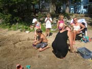 photo 1 of gallery 'Enjoying the Beach at Doe Lake'